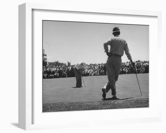 Golfer Putting the 12th Green-null-Framed Photographic Print