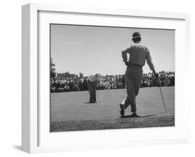 Golfer Putting the 12th Green-null-Framed Photographic Print