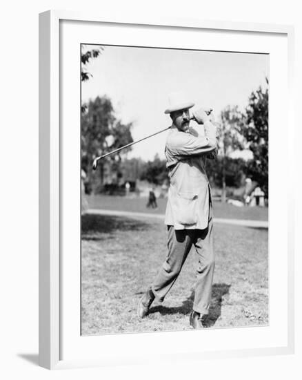 Golfer Ted Ray Swinging a Club Photograph-Lantern Press-Framed Art Print