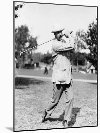 Golfer Ted Ray Swinging a Club Photograph-Lantern Press-Mounted Art Print