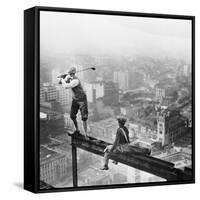 Golfer Teeing off on Girder High above City-null-Framed Stretched Canvas