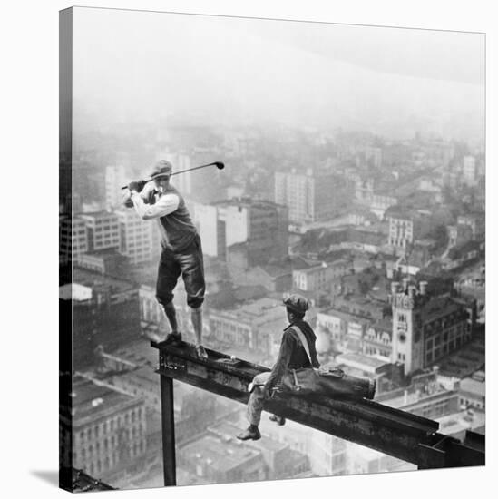 Golfer Teeing off on Girder High above City-null-Stretched Canvas