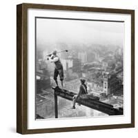 Golfer Teeing off on Girder High above City-null-Framed Photographic Print