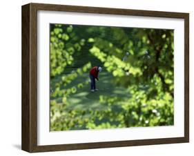 Golfers As Seen Through the Trees-null-Framed Premium Photographic Print