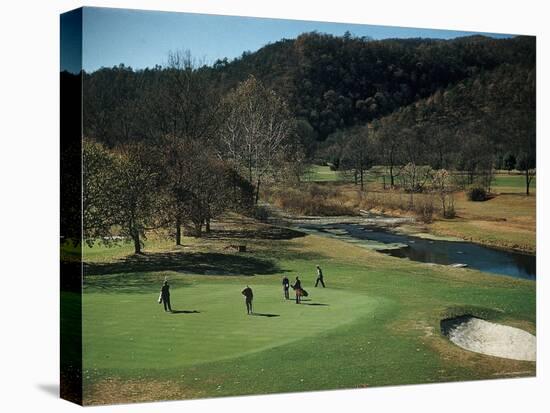 Golfers Playing on the No. 1 White Sulfur Golf Course-Walker Evans-Stretched Canvas