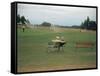 Golfers Sitting on Bench Near Practice Greens While Awaiting Tee Time on Pinehurst Golf Course-Walker Evans-Framed Stretched Canvas