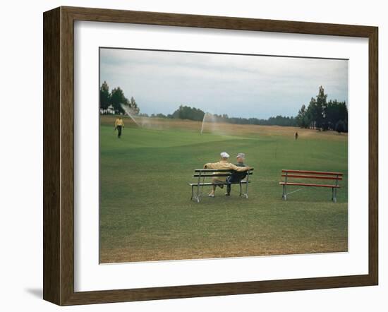 Golfers Sitting on Bench Near Practice Greens While Awaiting Tee Time on Pinehurst Golf Course-Walker Evans-Framed Photographic Print