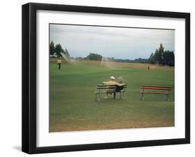 Golfers Sitting on Bench Near Practice Greens While Awaiting Tee Time on Pinehurst Golf Course-Walker Evans-Framed Photographic Print