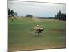 Golfers Sitting on Bench Near Practice Greens While Awaiting Tee Time on Pinehurst Golf Course-Walker Evans-Mounted Photographic Print