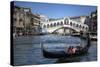 Gondola Grand Canal with Rialto Bridge in Background, Venice, Italy-Darrell Gulin-Stretched Canvas