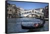 Gondola Grand Canal with Rialto Bridge in Background, Venice, Italy-Darrell Gulin-Framed Stretched Canvas