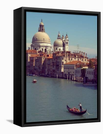 Gondola on the Grand Canal nearing the Santa Maria della Salute, Venice, Italy-Janis Miglavs-Framed Stretched Canvas