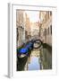 Gondola Parking under Bridge. Venice. Italy-Tom Norring-Framed Photographic Print