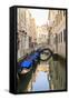 Gondola Parking under Bridge. Venice. Italy-Tom Norring-Framed Stretched Canvas