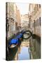 Gondola Parking under Bridge. Venice. Italy-Tom Norring-Stretched Canvas