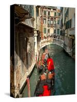 Gondolas along Canal, Venice, Italy-Lisa S. Engelbrecht-Stretched Canvas