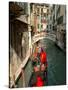 Gondolas along Canal, Venice, Italy-Lisa S. Engelbrecht-Stretched Canvas