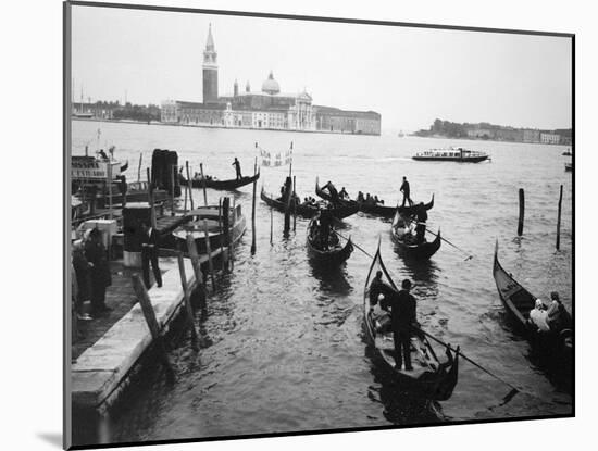 Gondolas and Gondoliers on a Rainy Day in Venice Italy, June 1965-null-Mounted Premium Photographic Print