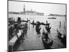 Gondolas and Gondoliers on a Rainy Day in Venice Italy, June 1965-null-Mounted Photographic Print