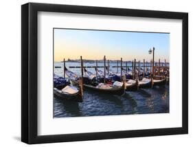 Gondolas covered in snow with view to La Guidecca, sunrise, Venice, UNESCO World Heritage Site, Ven-Eleanor Scriven-Framed Photographic Print