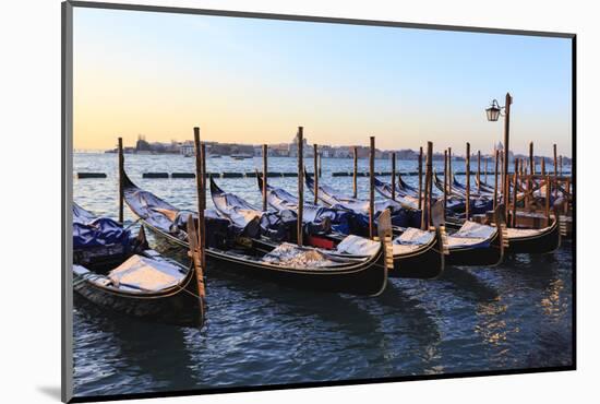 Gondolas covered in snow with view to La Guidecca, sunrise, Venice, UNESCO World Heritage Site, Ven-Eleanor Scriven-Mounted Photographic Print