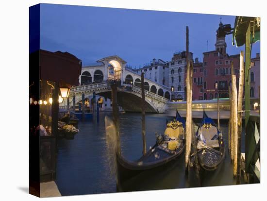 Gondolas Moored on the Grand Canal at Riva Del Vin, with Rialto Bridge Behind, Venice, Veneto-Hazel Stuart-Stretched Canvas