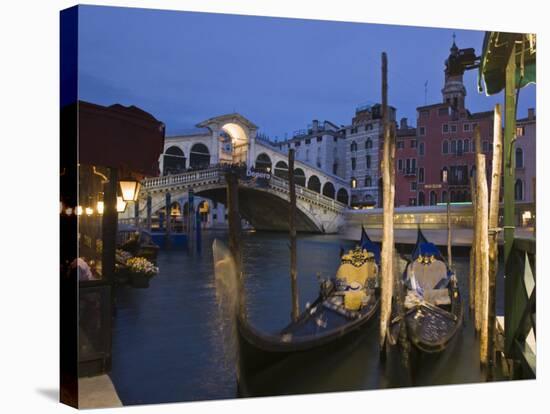 Gondolas Moored on the Grand Canal at Riva Del Vin, with Rialto Bridge Behind, Venice, Veneto-Hazel Stuart-Stretched Canvas