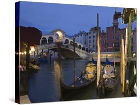 Gondolas Moored on the Grand Canal at Riva Del Vin, with Rialto Bridge Behind, Venice, Veneto-Hazel Stuart-Stretched Canvas