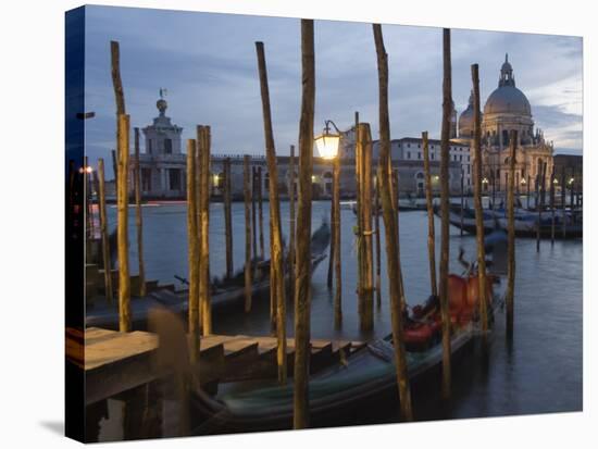 Gondolas on Waterfront at Night, Church Basilica, Venice, Unesco World Heritage Site, Veneto, Italy-Christian Kober-Stretched Canvas