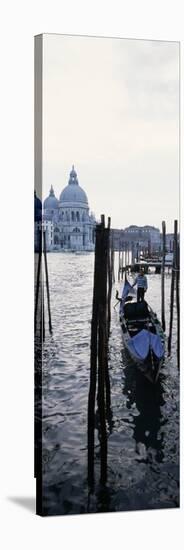 Gondolier in Gondola with Cathedral in Background, Santa Maria Della Salute, Venice, Veneto, Italy-null-Stretched Canvas