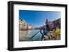 Gondolier paddling a gondola in Venice, Italy, Europe-Mark A Johnson-Framed Photographic Print