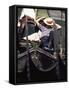 Gondolier Relaxing in Gondola, Venice, Veneto, Italy-Adam Woolfitt-Framed Stretched Canvas