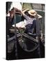 Gondolier Relaxing in Gondola, Venice, Veneto, Italy-Adam Woolfitt-Stretched Canvas