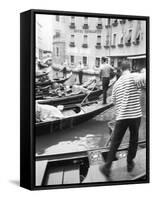 Gondoliers, Venice, Italy-Walter Bibikow-Framed Stretched Canvas