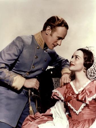 https://imgc.allpostersimages.com/img/posters/gone-with-the-wind-1939-directed-by-victor-flemingleslie-howard-and-olivia-by-havilland-photo_u-L-Q1C3T6J0.jpg?artPerspective=n