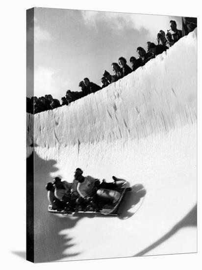 Good of Cresta Run, Bobsled Run, Coasting around Sunny Bend as People Peer from Above the Track-Alfred Eisenstaedt-Stretched Canvas