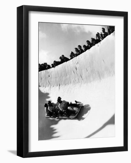Good of Cresta Run, Bobsled Run, Coasting around Sunny Bend as People Peer from Above the Track-Alfred Eisenstaedt-Framed Photographic Print