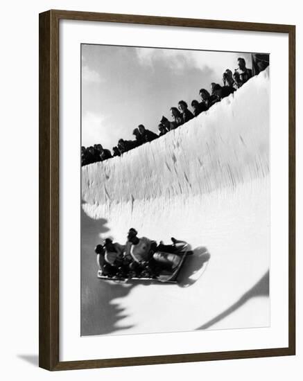 Good of Cresta Run, Bobsled Run, Coasting around Sunny Bend as People Peer from Above the Track-Alfred Eisenstaedt-Framed Photographic Print