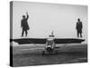 Goodyear Aircraft Engineers Standing on Wings of Rubber Airplane, Can Fly 60 MPH with 200 yd Runway-Grey Villet-Stretched Canvas