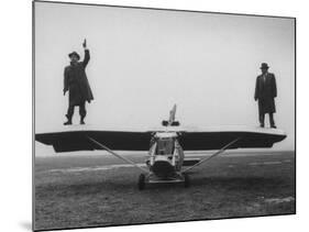 Goodyear Aircraft Engineers Standing on Wings of Rubber Airplane, Can Fly 60 MPH with 200 yd Runway-Grey Villet-Mounted Photographic Print