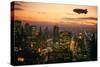 Goodyear Blimp Sails over Midtown Manhattan Skyline at Dusk, New York City. Blimps are No.. (Photo)-James L Stanfield-Stretched Canvas