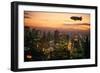 Goodyear Blimp Sails over Midtown Manhattan Skyline at Dusk, New York City. Blimps are No.. (Photo)-James L Stanfield-Framed Giclee Print