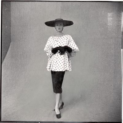 Fashion Model Showing Polka Dotted Smock Top over Black Skirt by Balenciaga