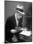 Gossip Columnist Walter Winchell Checking Script Before His Radio Broadcast at NBC Radio Studio-Alfred Eisenstaedt-Mounted Photographic Print