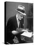 Gossip Columnist Walter Winchell Checking Script Before His Radio Broadcast at NBC Radio Studio-Alfred Eisenstaedt-Stretched Canvas