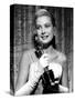 Grace Kelly with her Academy Award for COUNTRY GIRL, 3/30/55-null-Stretched Canvas