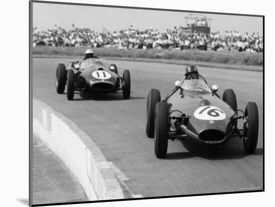 Graham Hill Leads in his Lotus 16 from Jack Brabham in Cooper T45, 1958 British Grand Prix-null-Mounted Photographic Print