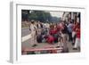 Graham Hill Watches Mechanics Working on a Car, French Grand Prix, Rouen, 1968-null-Framed Photographic Print