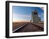 Grain elevator and railroad track, Milk River, Alberta, Canada-null-Framed Photographic Print
