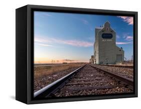 Grain elevator and railroad track, Milk River, Alberta, Canada-null-Framed Stretched Canvas